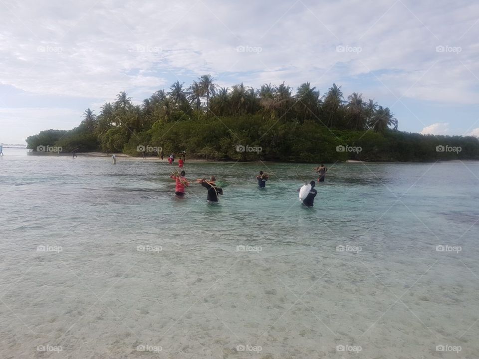Walking on shallow water during low tide and going another island for various purpose is great exercise.