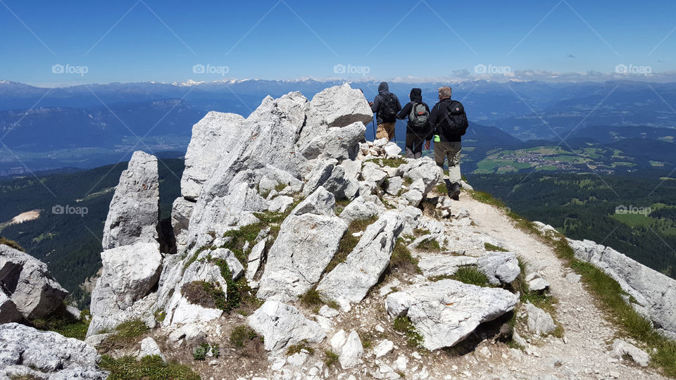 Hiking at high altitude in the mountains with panoramic view 