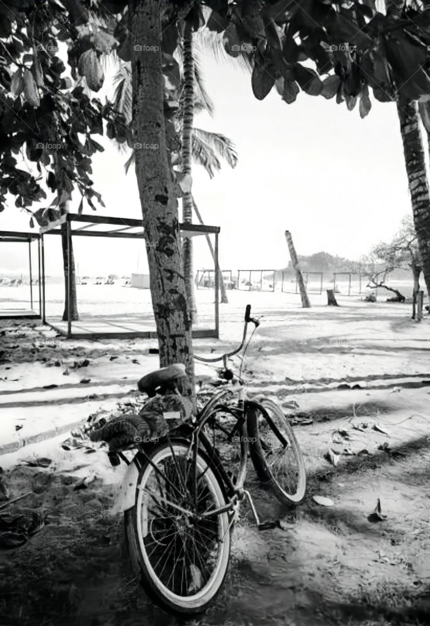 Shot of lonely bicycle on the beach.!