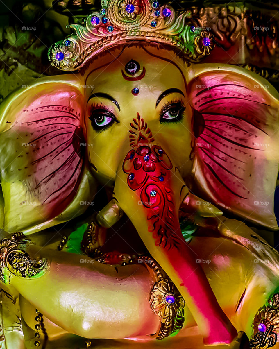 Ganesha is one of the most popular deities in Hindu Mythology and is also known as the The Lord of Beginnings, The Remover of Obstacles and Vakratunda. He is most identified because of Elephant head.
