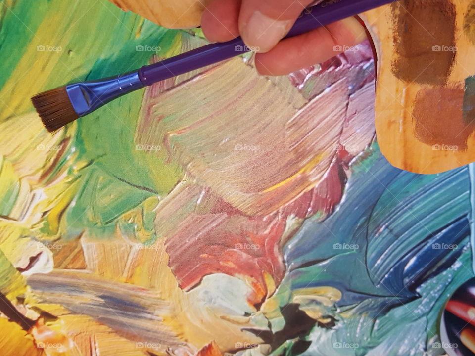 Close-up of painting with paintbrush