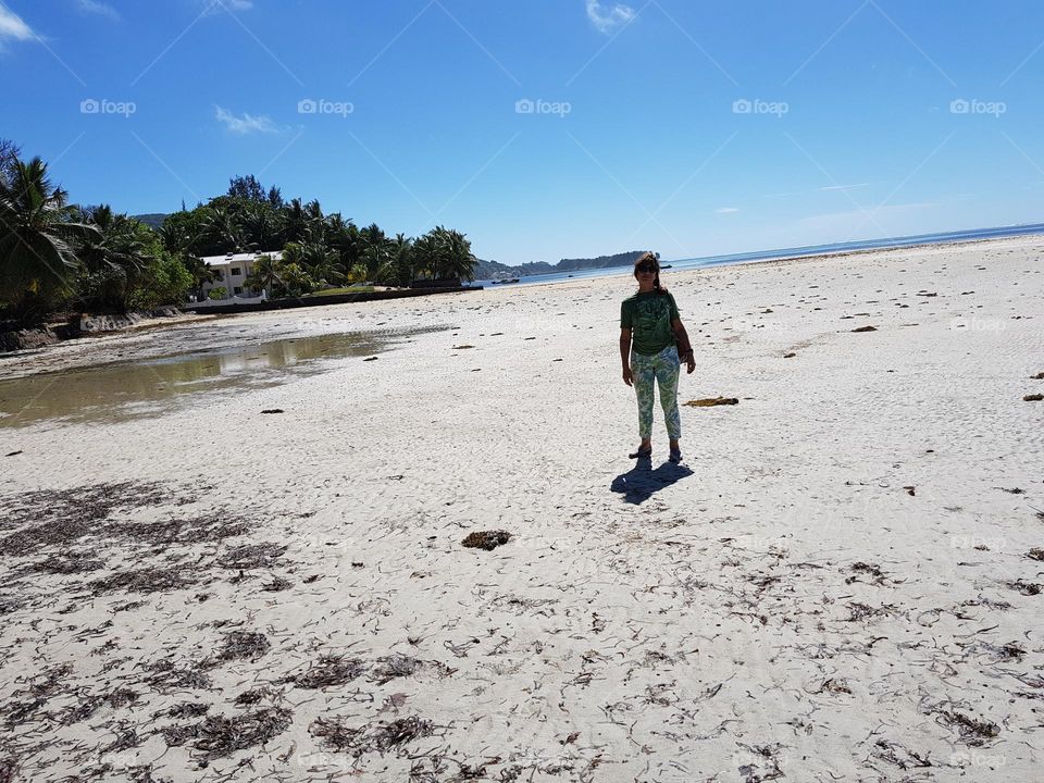 Walking on the beach in Seychelles