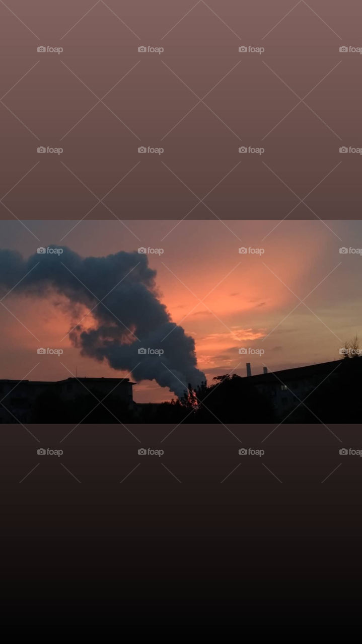 Sunset. Pollution. My town. When it gets dark. Quiet. 