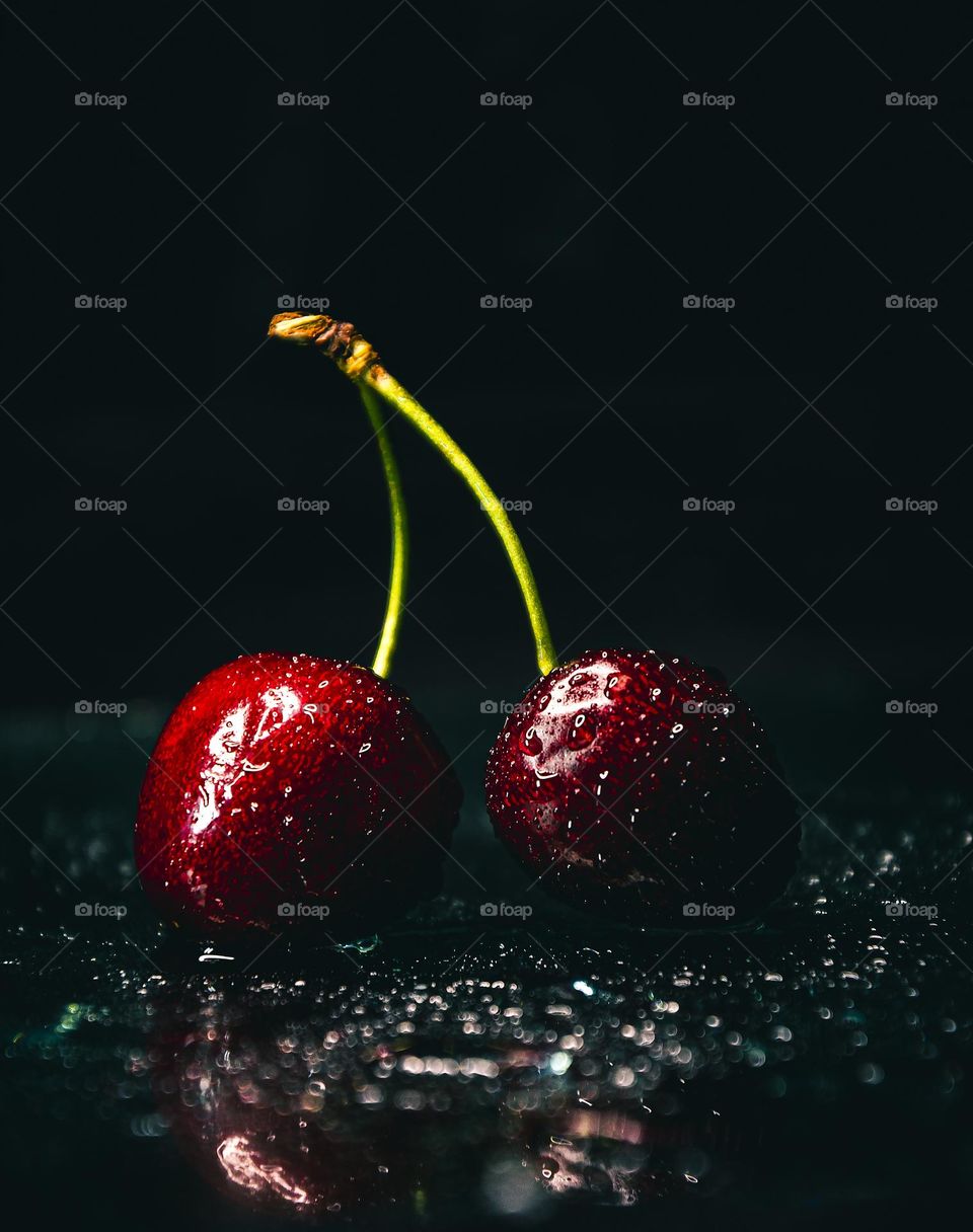 Cherries on a black background