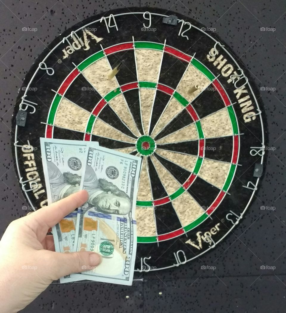 Dart Board and Money