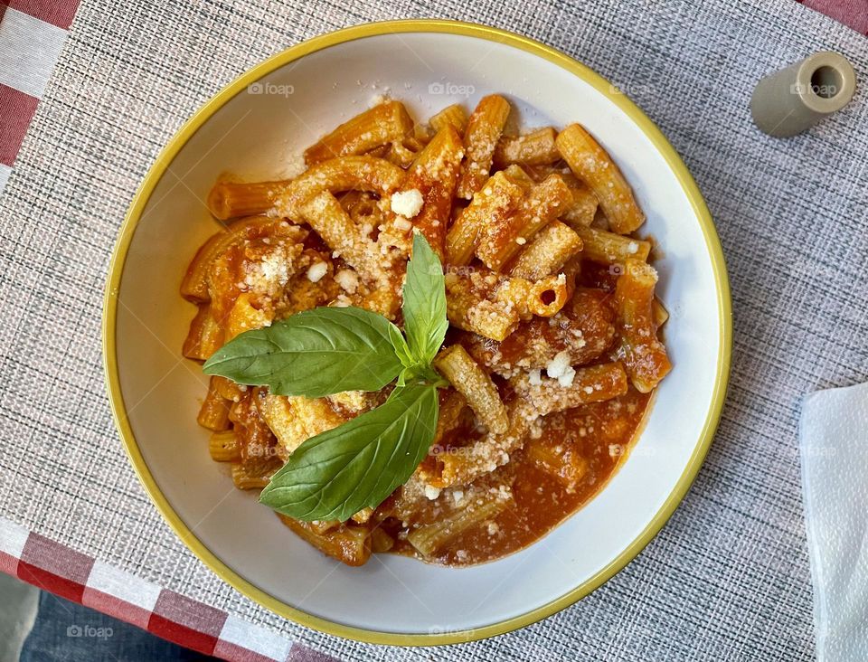 Italian pasta with cheese and tomato sauce 