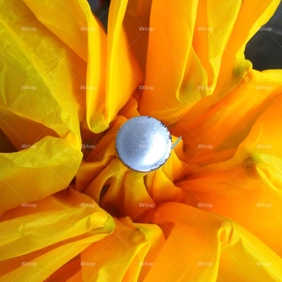 Circle shape on yellow umbrella