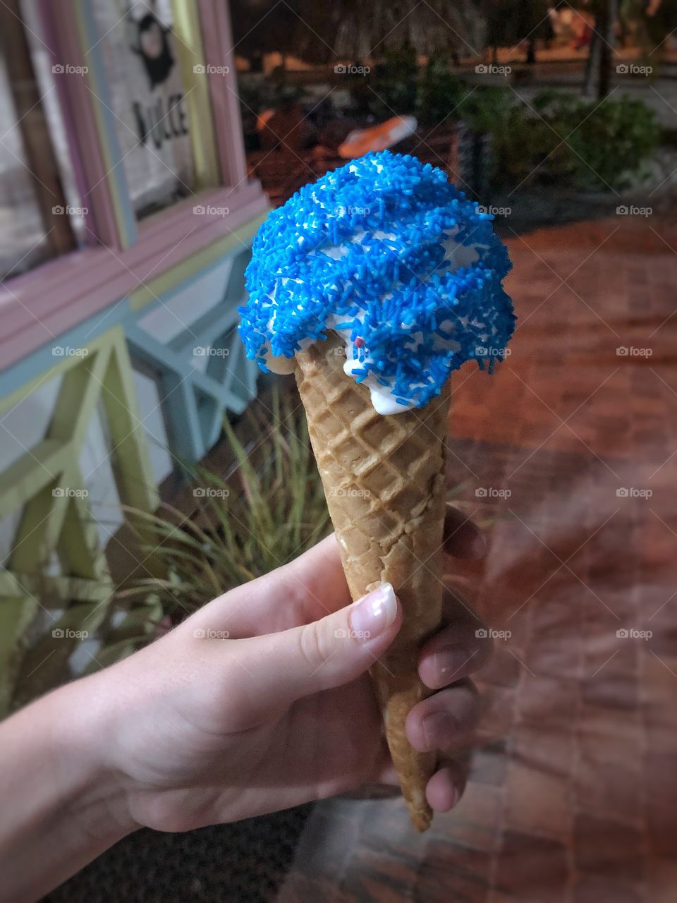 Ice cream cone with blue sprinkles