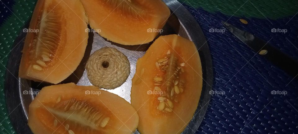 Muskmelon like watermelon. Muskmelon is in round shape. tasty, delicious, and sweet fruit. This fruit is summer snacks.