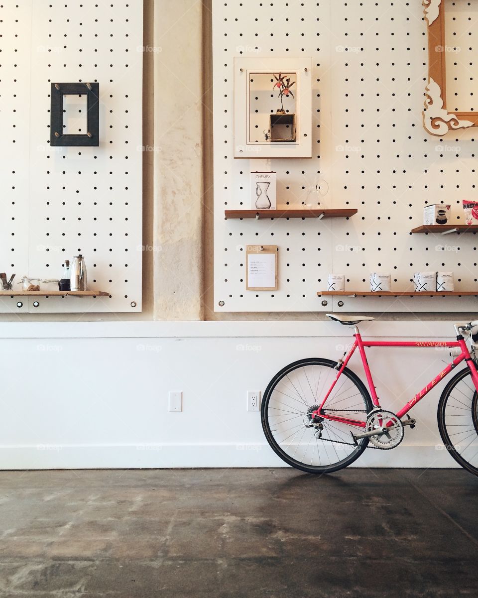 Pink bicycle at the coffee shop. 