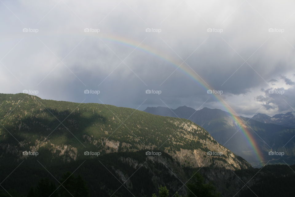 Rainbow above brig in the Swiss Alps. During our visit in Blatten bei Naters at the Belalp, I captured this rainbow above the town of Brig.