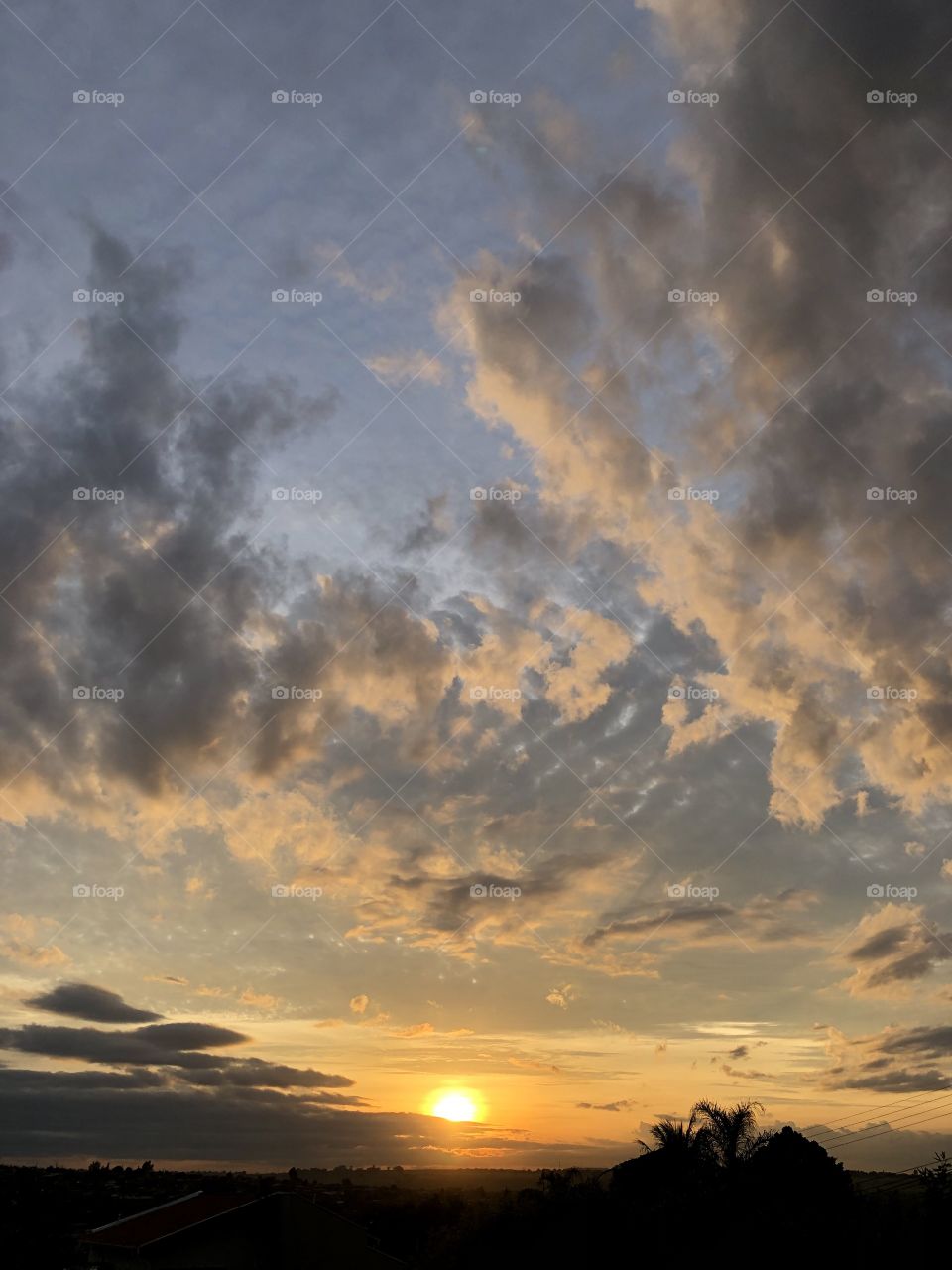 When the sun joins the clouds, which in turn have joined the sky and landscape, this is the result: a sunrise that looks like a picture, blessing all those dare to wake up early to admire and enjoy this wonder.