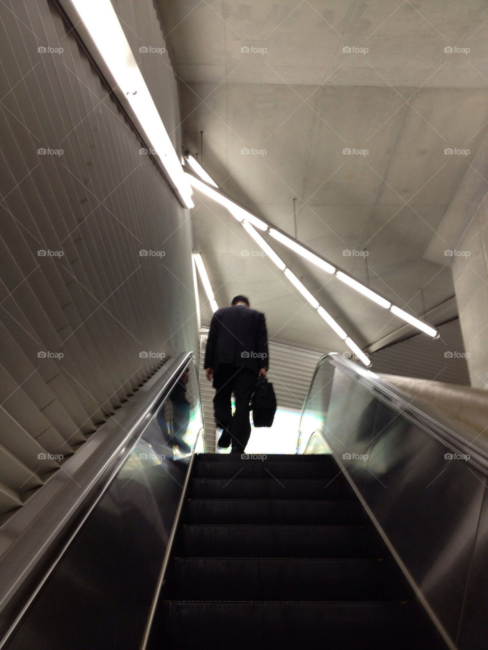 man subway escalator japan by jonk