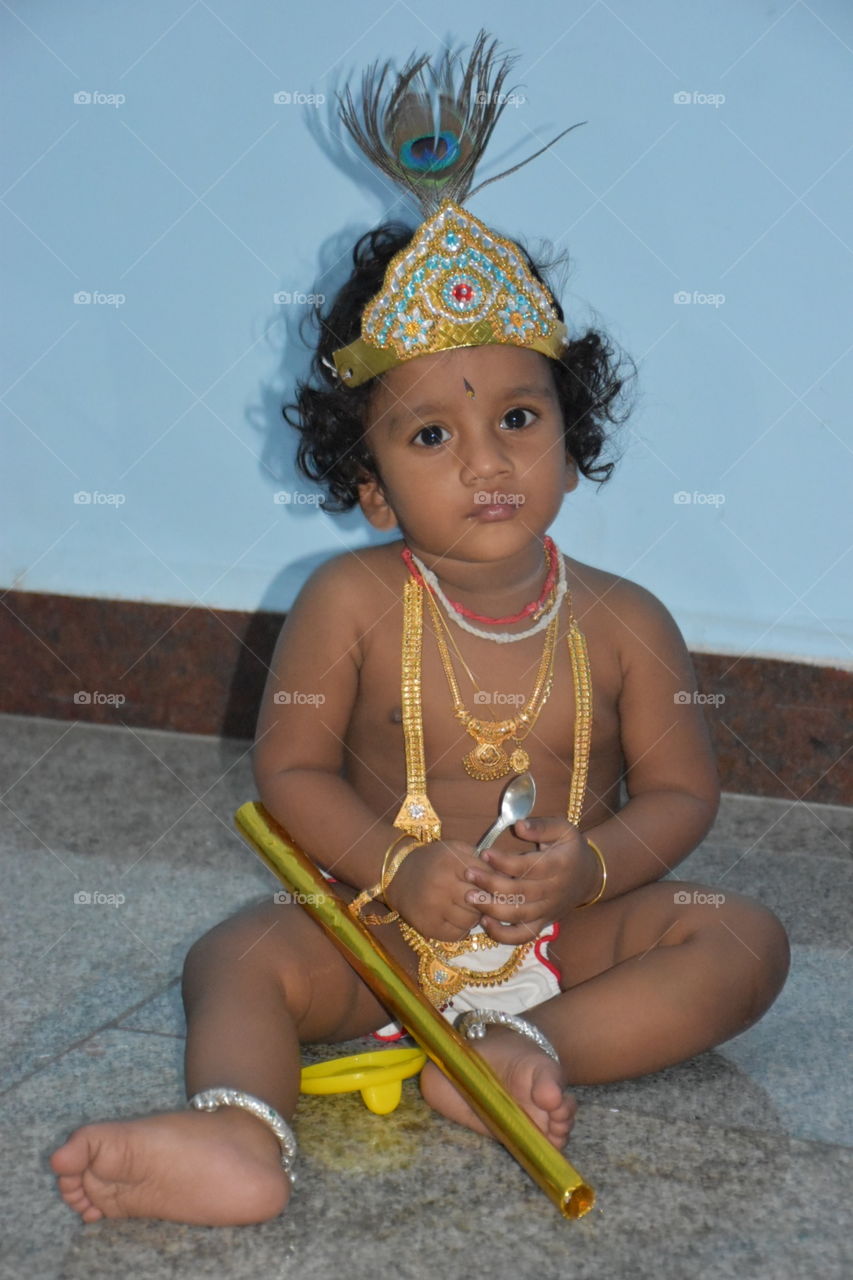 Baby boy in lord krishna dress