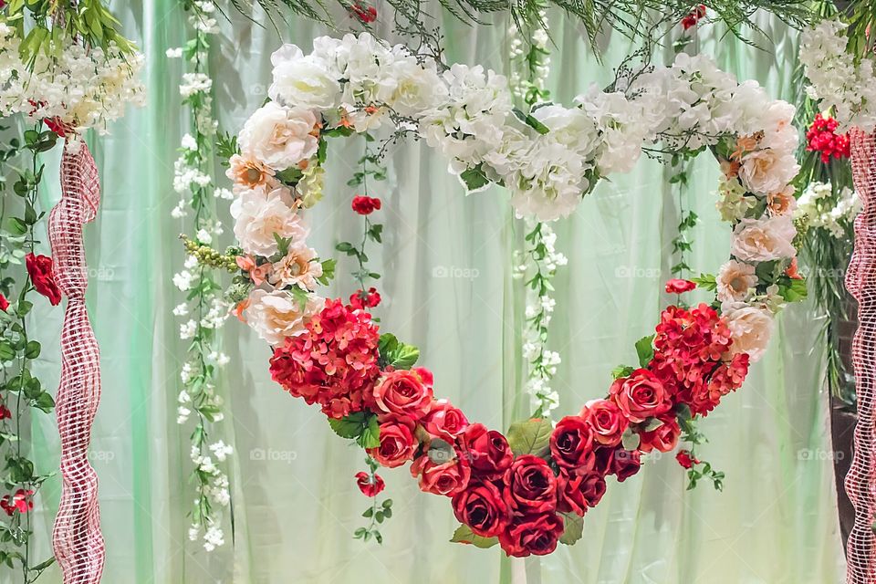 Heart shape flowers decoration at wedding