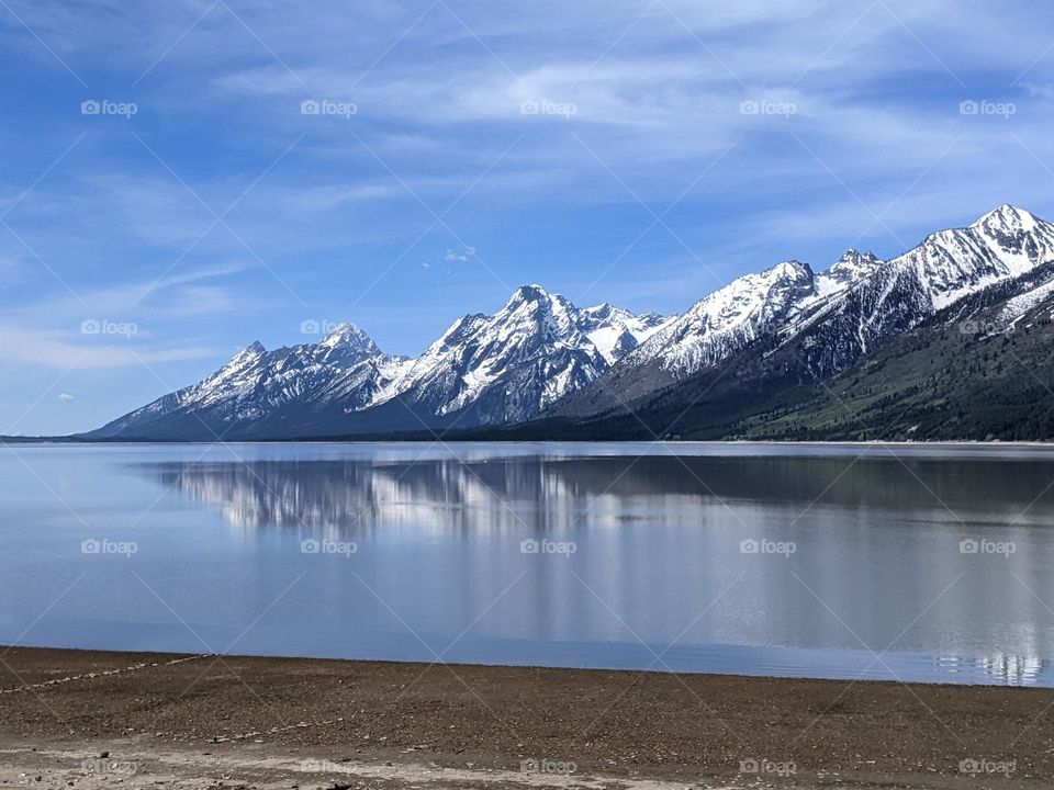 mountain range reflected in the lake
