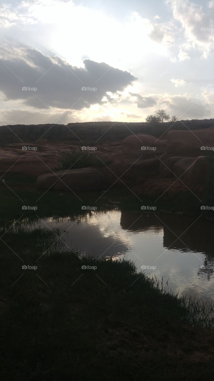 Reflection of clouds on the valley pond