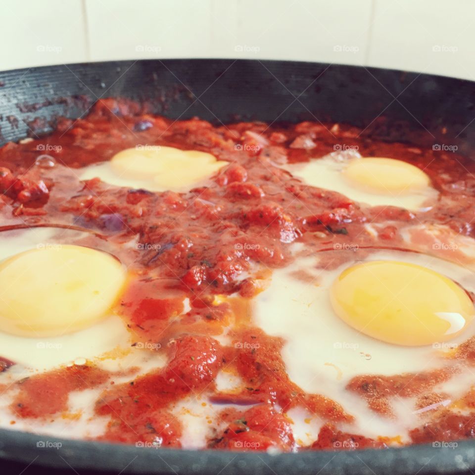 Cooking shakshuka