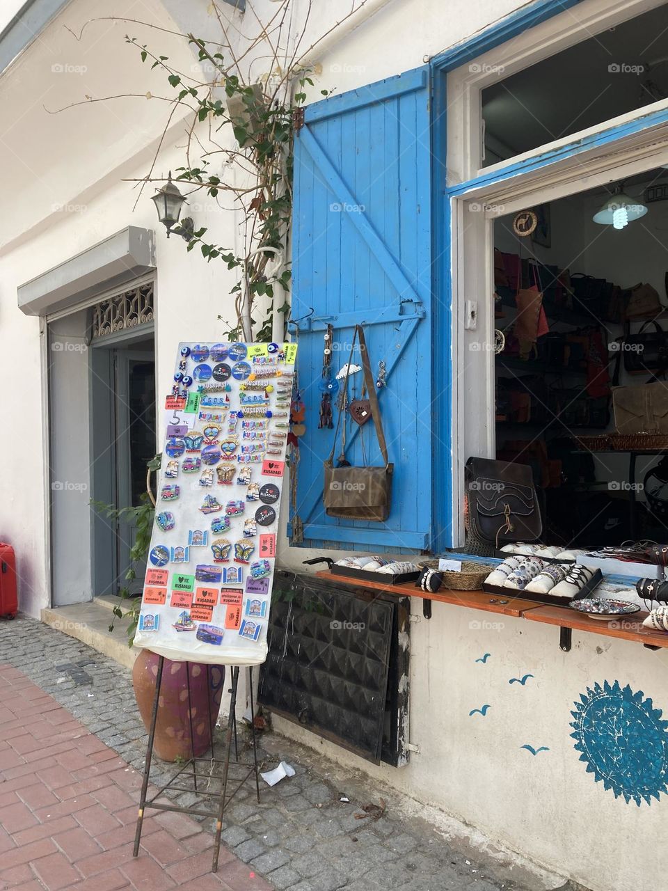 Summertime in Kusadasi, Turkey. Sunny day in charming sunny city. Ocean and blue sky. Colorful lovely city of Turkey. Summer vacation trips are my favorite. 