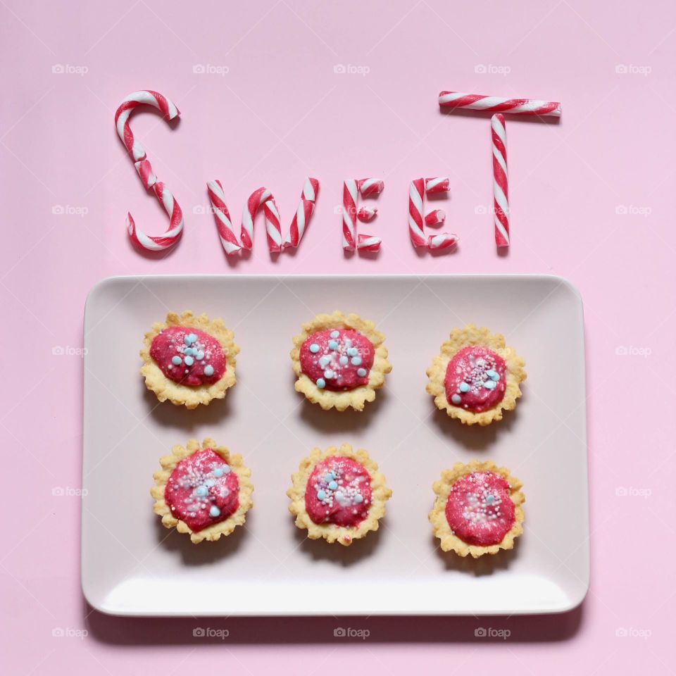 Sweets on a pink background.