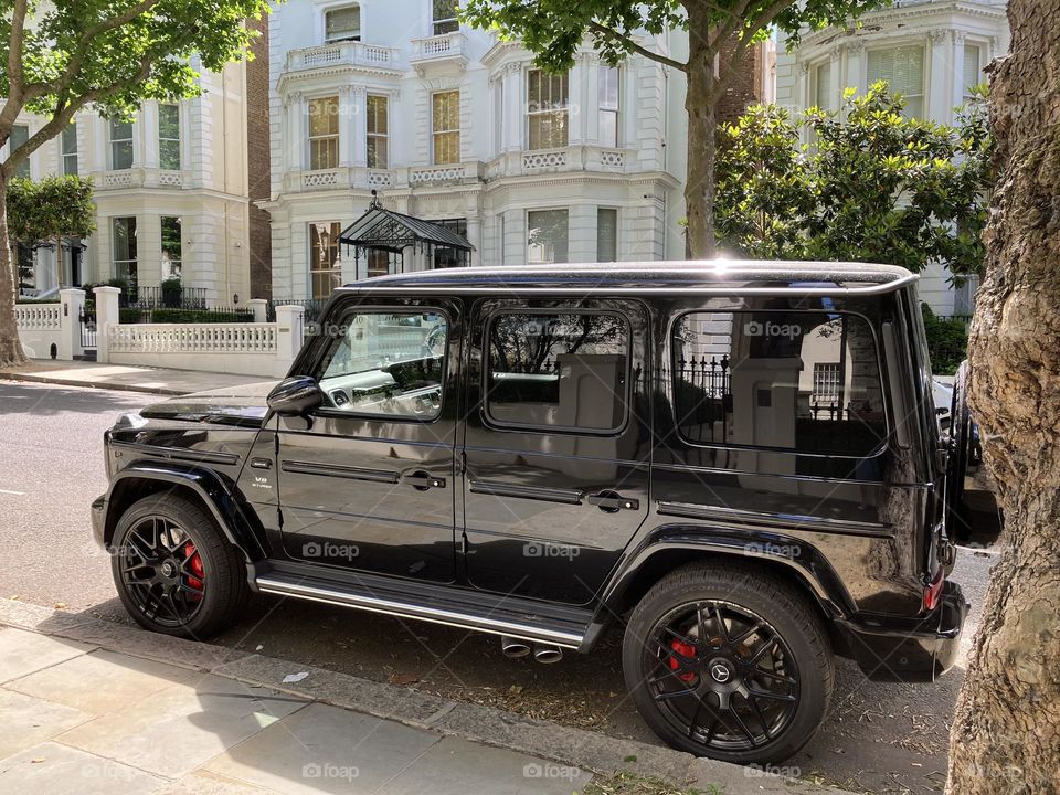 Ordinary car for this upmarket wealthy residential street in London 