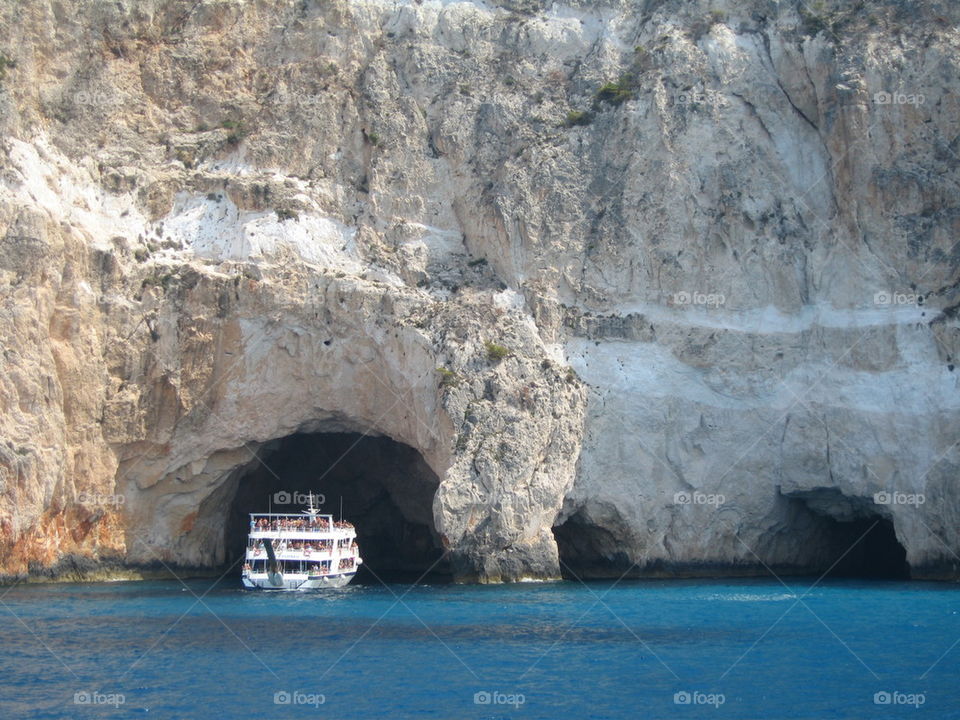 big excursion boat in cave