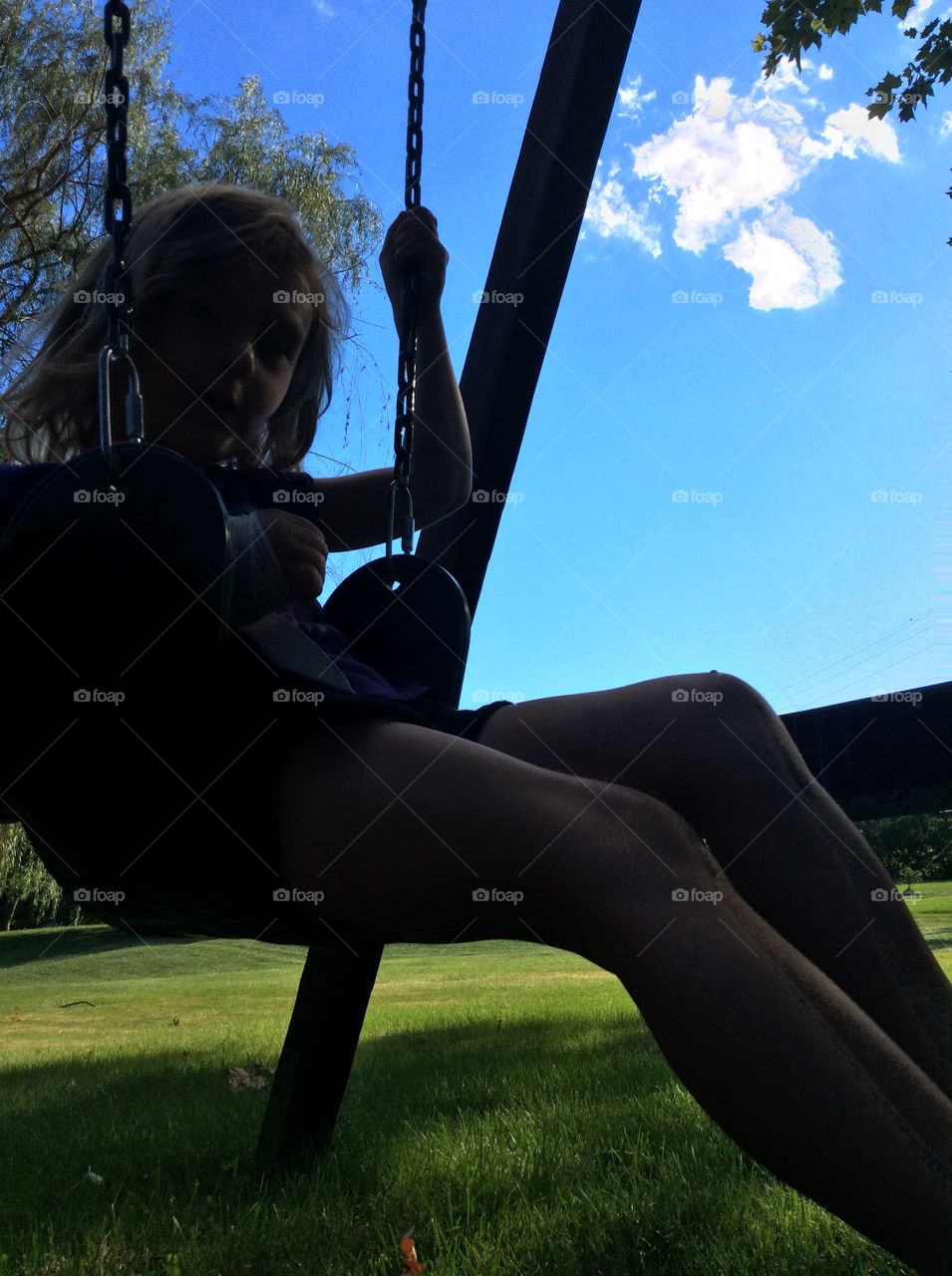 Relaxing sitting on swing