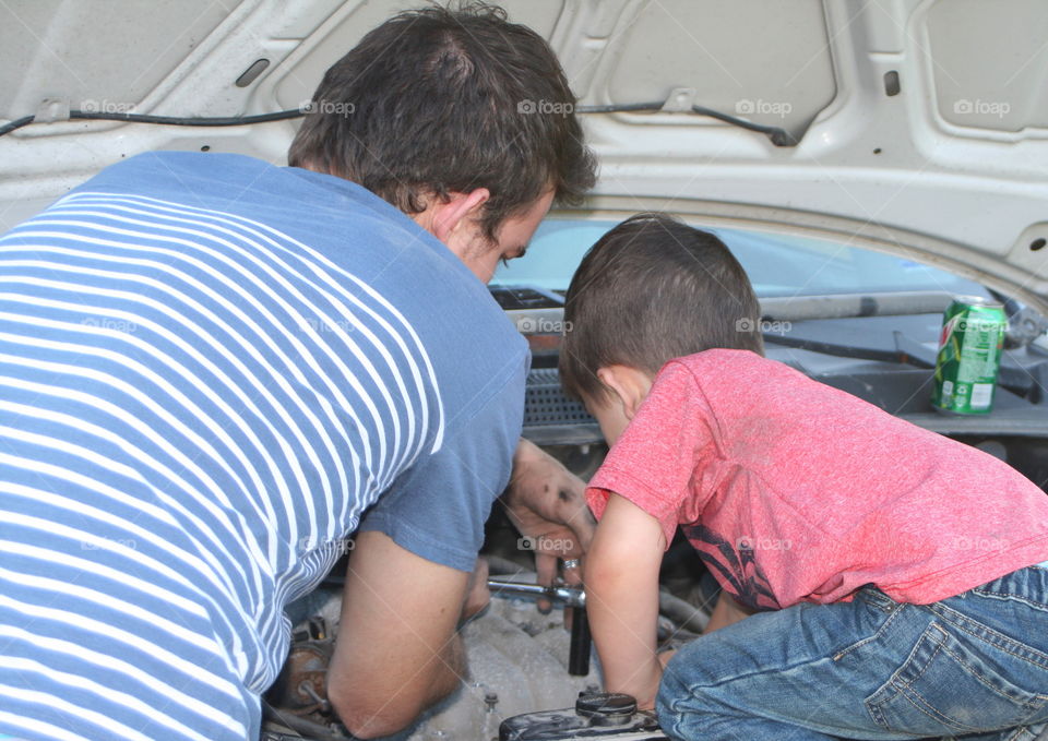 Father and son mechanics 