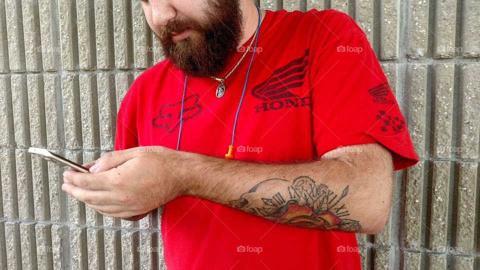 such a good looking guy with a great beard and tattoos