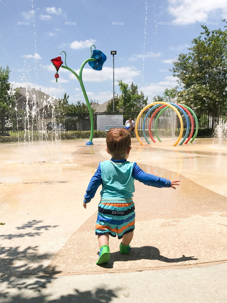 Baby boy at the splash pad