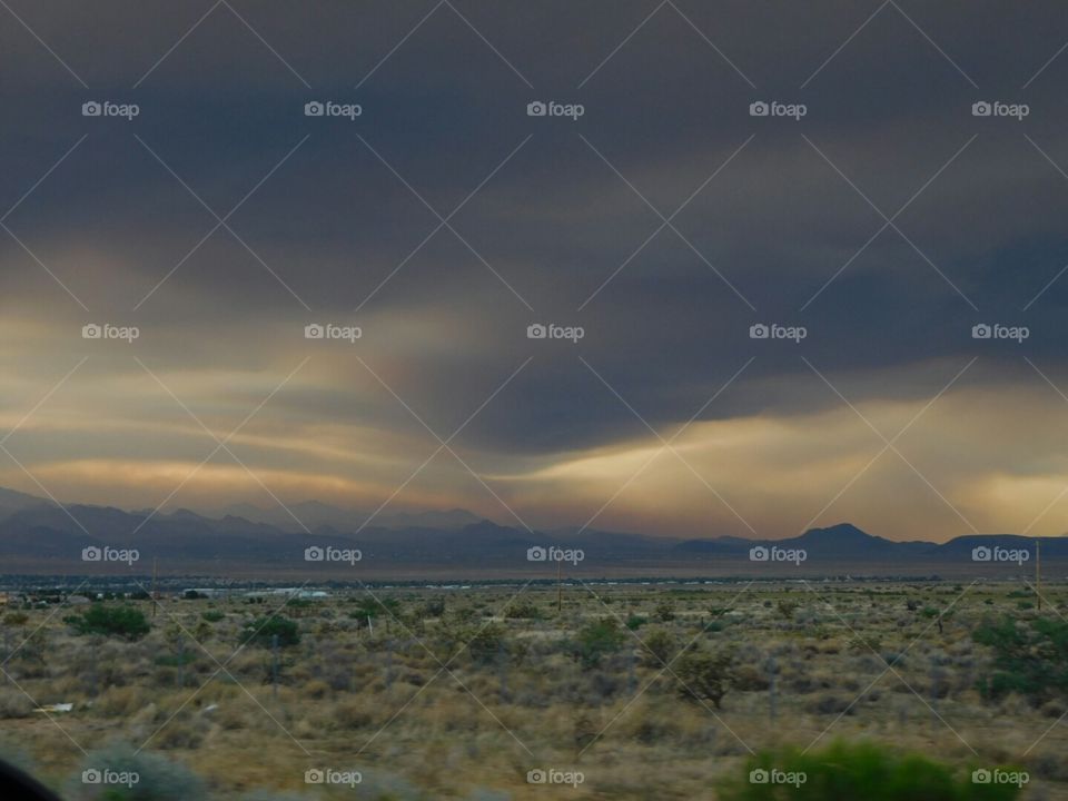 Sunset with smoke from fire