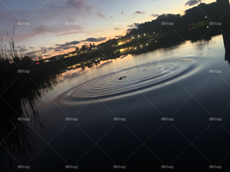 Sunset at a Lake in Michigan, stone in the water 