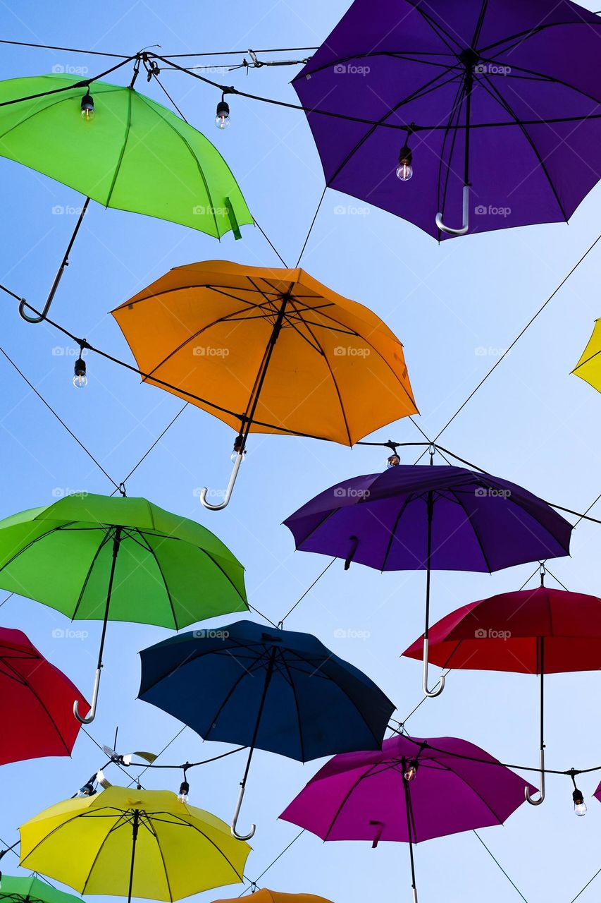 Perfect umbrella colors to match with the bright blue clear sky