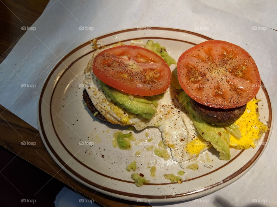 sausage egg avocado tomato sandwich