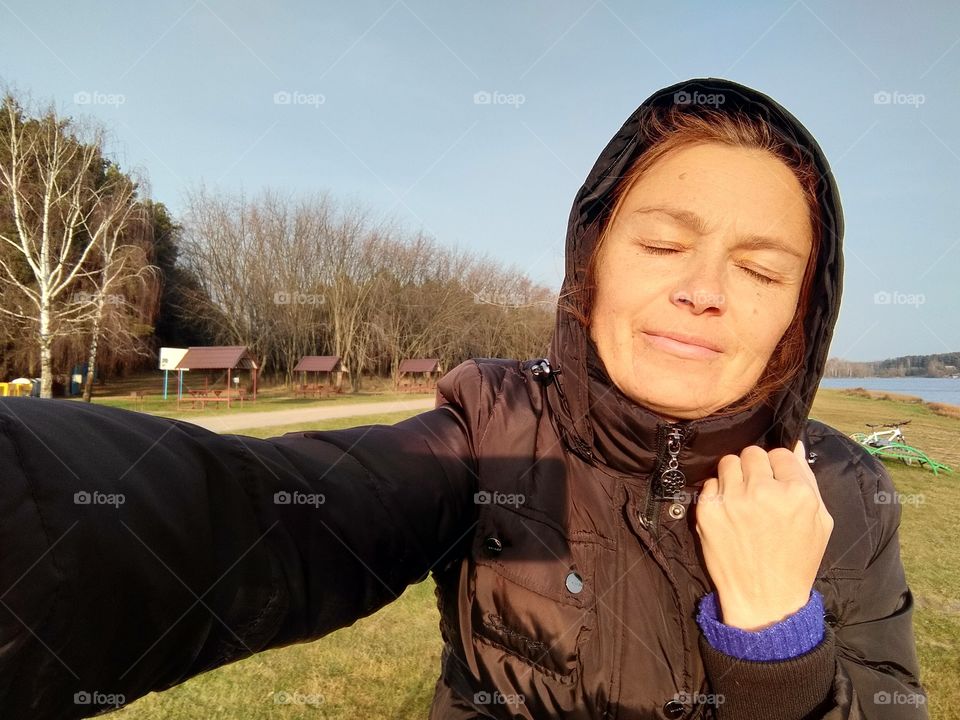 selfie girl on the nature in the solar light