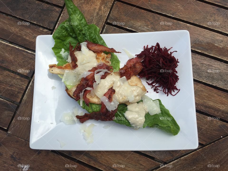Chicken filet with lettuce, cheese, bacon