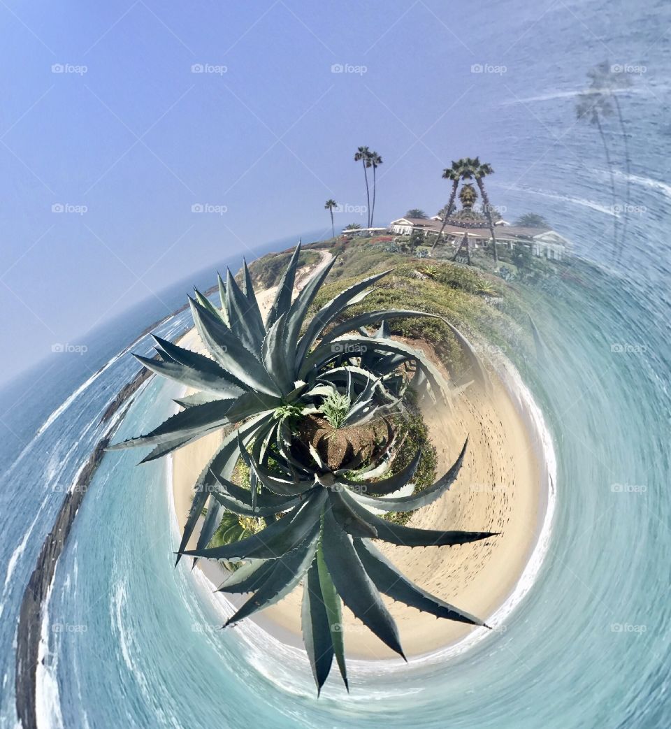 Tiny planet of tropical scene