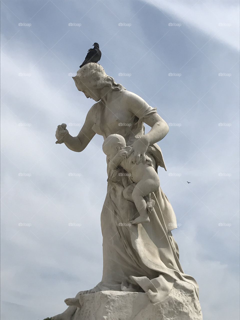 Bird on a sculpture 