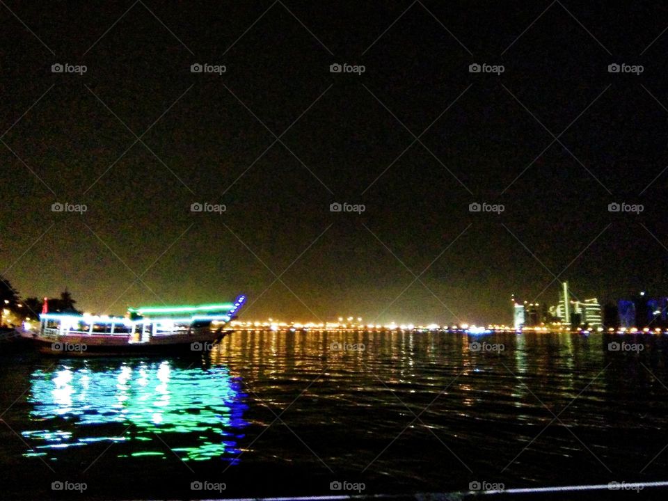Dhow cruise at corniche Qatar with fantastic view at night.