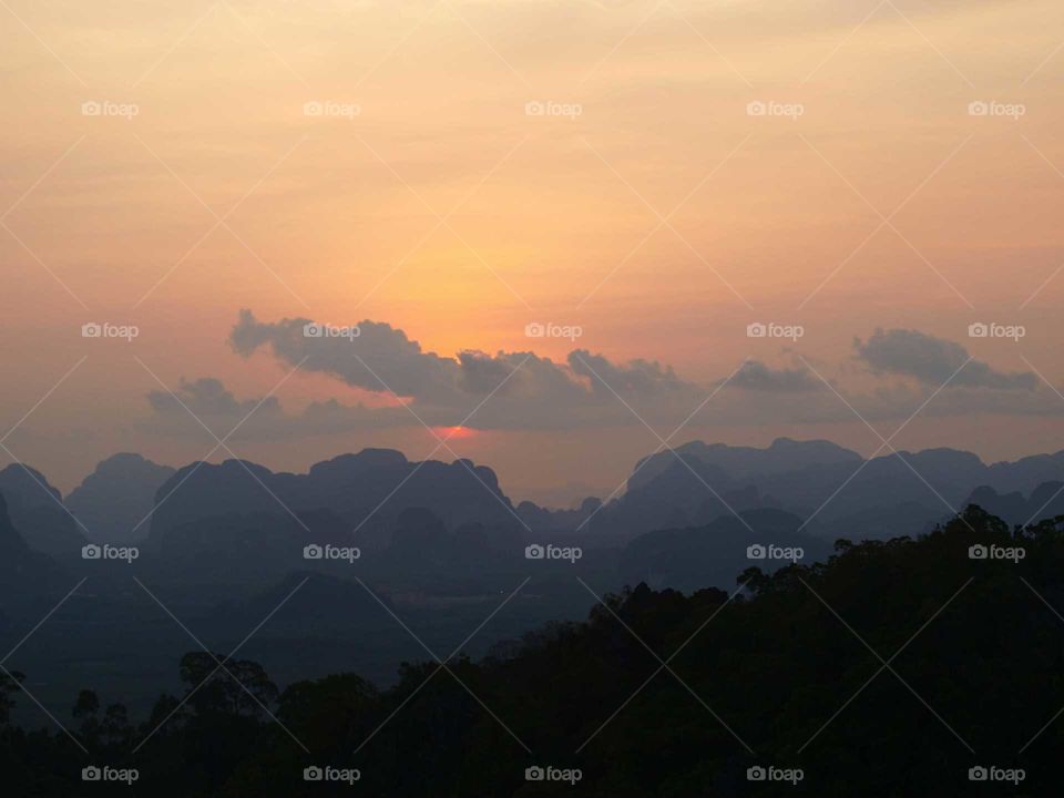 Silhouette of hills during the sunset
