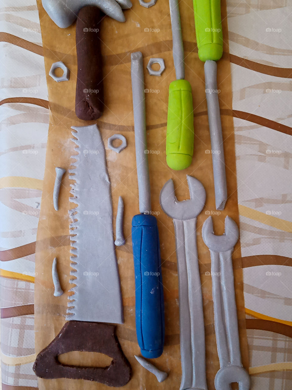 a handmade imitation of tools shaped with the fondant