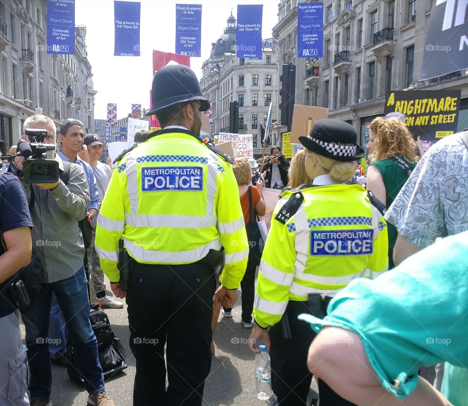 Police at the London March against Trump visit in UK, resist Trump, London March, 13 July 2018