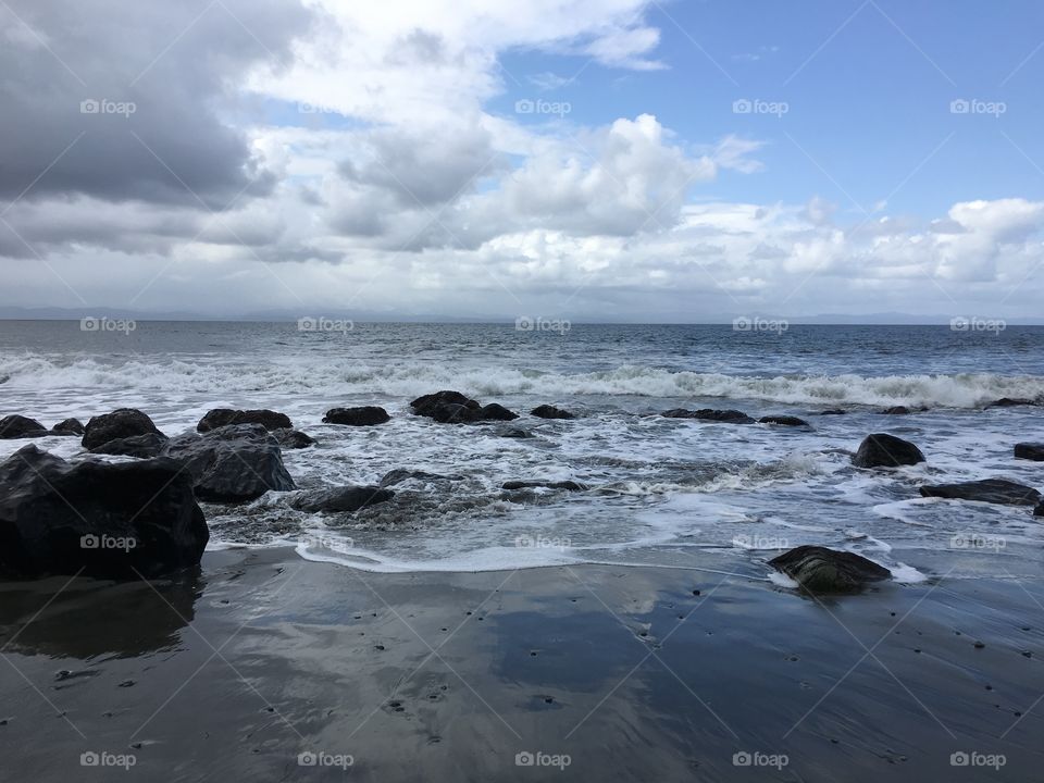 Clouds reflecting on sea