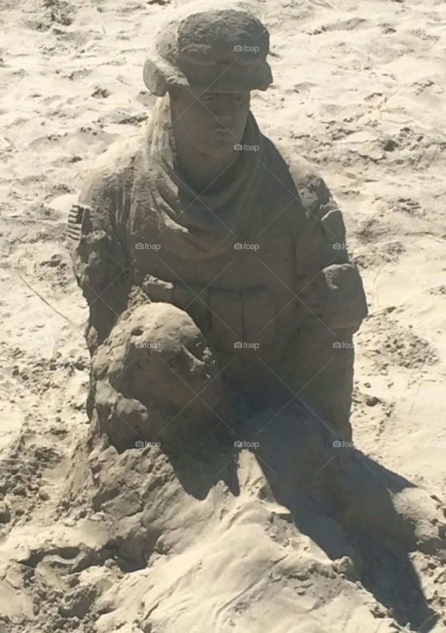 The Great Sacrifice. this man created this in two days. what an amazing sand castle