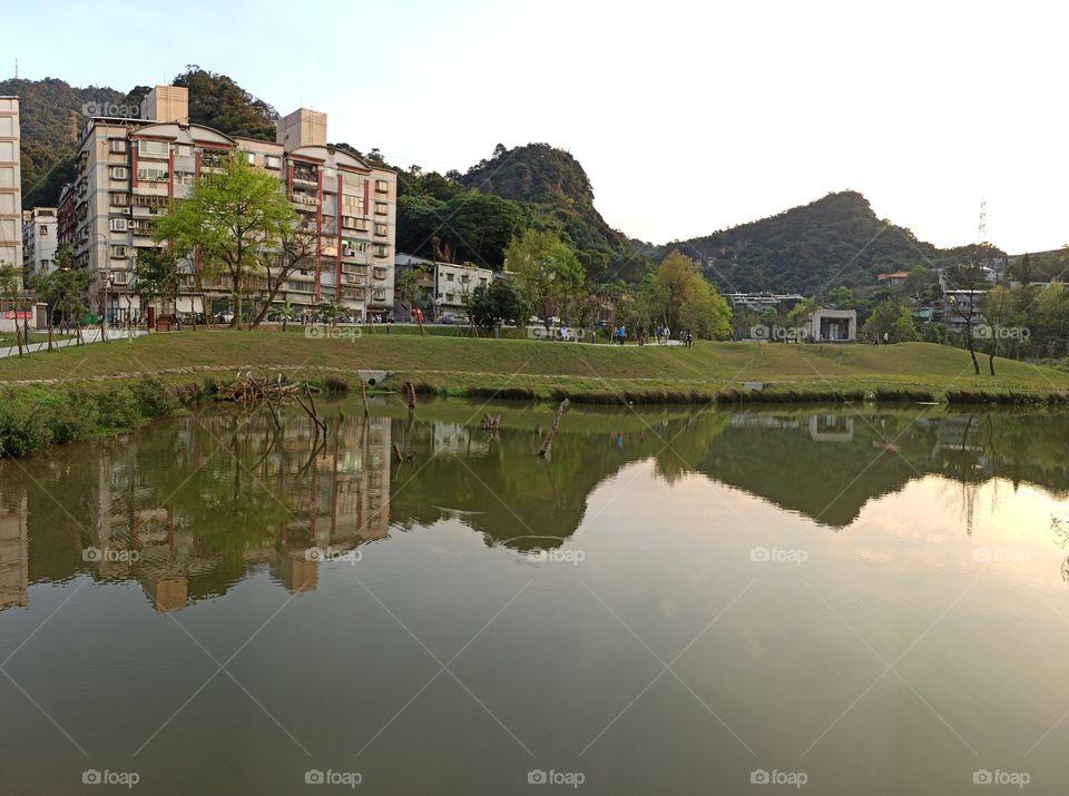 The reflection of the mountain.