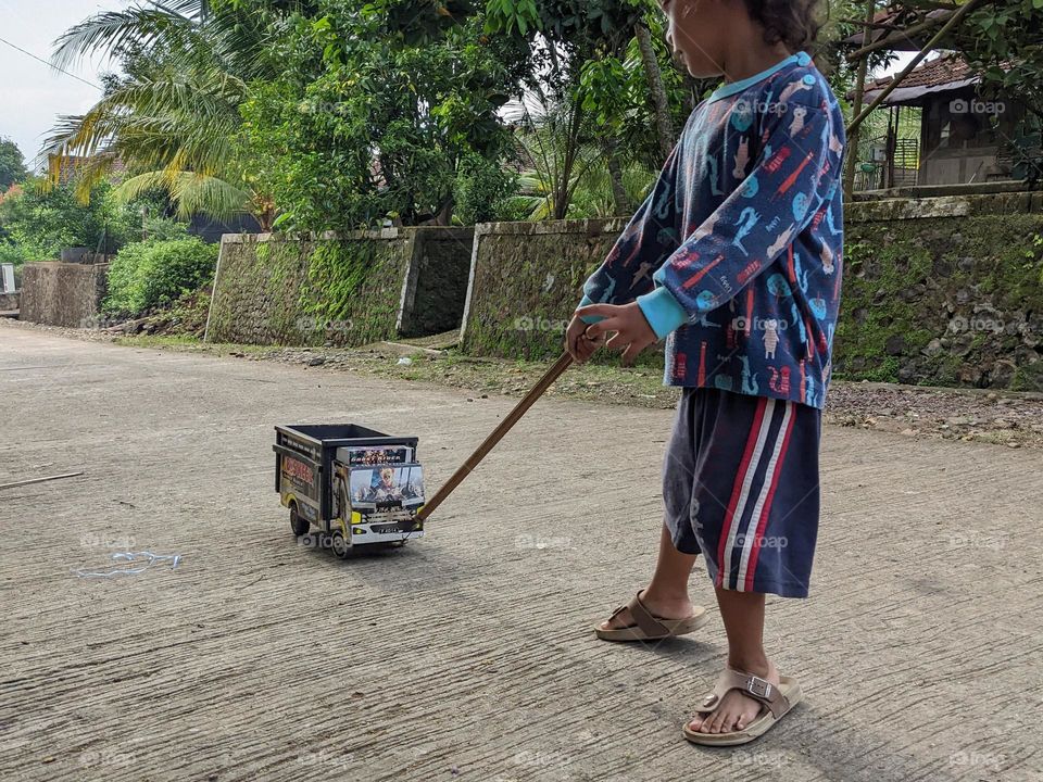 Play with toy trucks