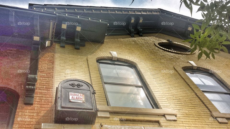 Architecture . Old Burglar Alarm on Historic Building 