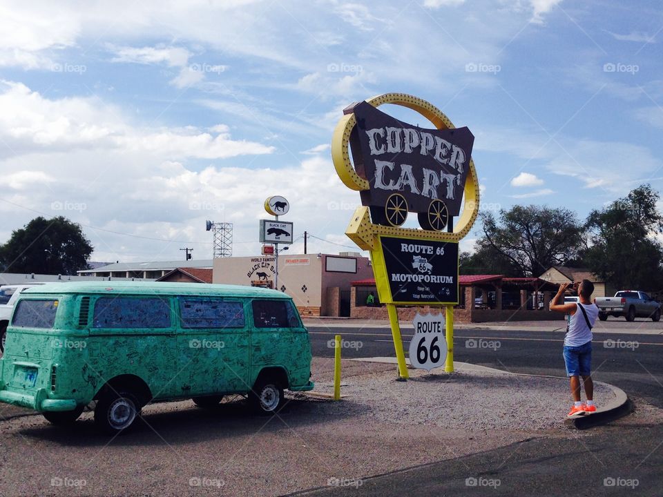 In front of the Copper Cart sign
On the route 66