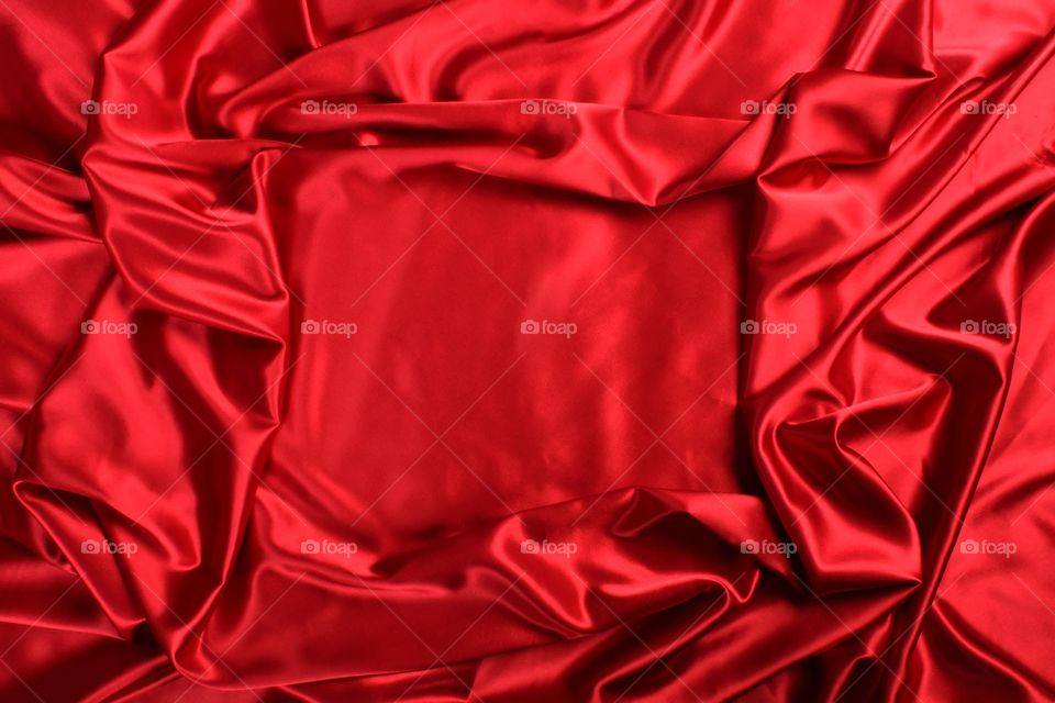 Red satin in the shape of a frame