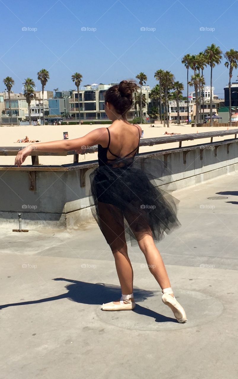 This beautiful dancer was taking some lovely dance photos on the pier